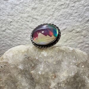 Luminescent Aurora Opal Doublet with Wood Mountains Sterling Silver Ring